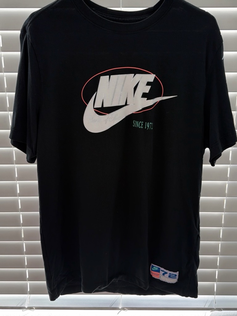 Nike Black Short-Sleeve Tee with White Logo and Red Outline
